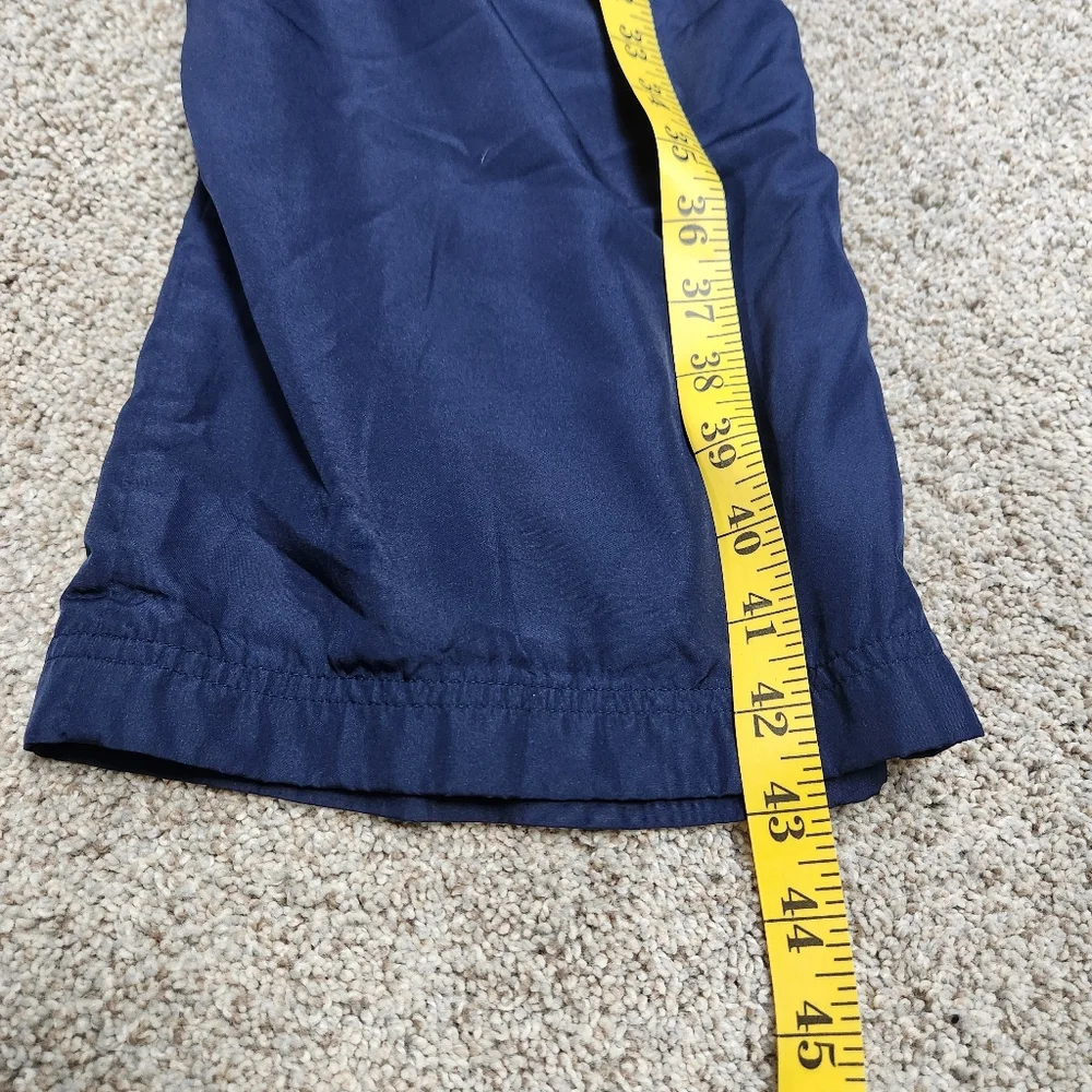 Men's Blue Under Amour Loose Athletic Pants with White Side Stripe and Zipper